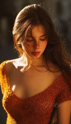 Woman with long hair and an off-shoulder top in golden hour light