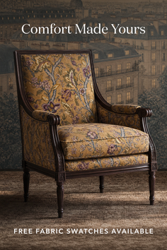 Armchair with floral pattern upholstery and ornate wooden frame