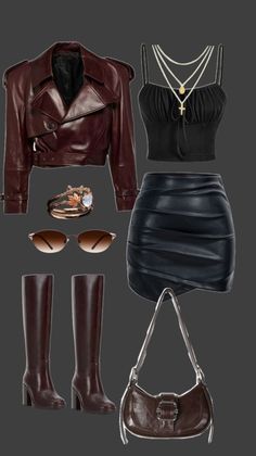 A flat lay of a dark brown leather jacket, black crop top, and black leather skirt