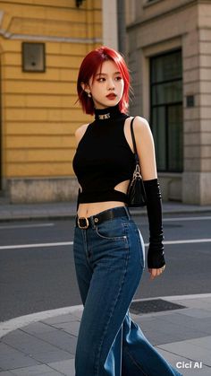 Woman with red hair in a black crop top and jeans on a city street