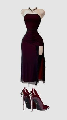 Burgundy strapless dress with a high slit and matching high heels on a mannequin
