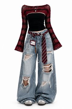 Full body shot of a fashion outfit with ripped jeans and a crochet top