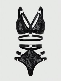 Black lace lingerie set with strappy details and silver rings