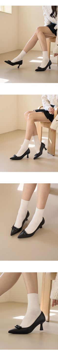 Person wearing black heels with white socks, sitting indoors with soft lighting