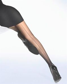 Woman's legs in black dress, seamed stockings, and high heels