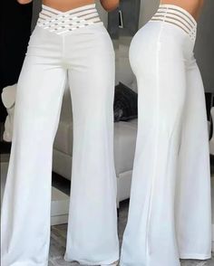 Woman wearing white wide-leg pants with a high, cut-out waist design