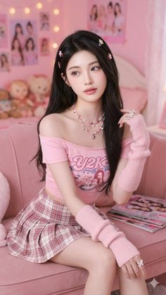 Woman with long black hair in a pink plaid skirt and off-shoulder top