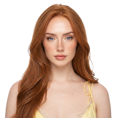 Woman with red hair and blue eyes wearing a yellow top with lace trim