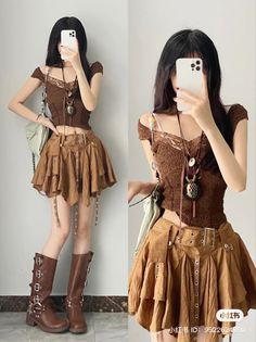 Woman in a brown top and mini skirt with knee-high boots taking a mirror selfie