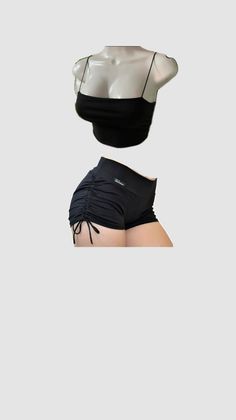 Black crop top and ruched shorts displayed on a mannequin