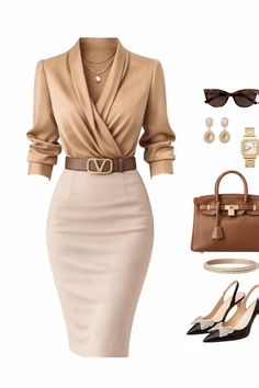 A business attire flat lay with a blouse, pencil skirt, and accessories