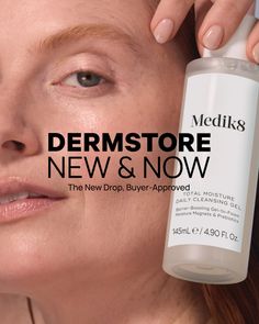 Close up of a person's face with a hand holding a skincare product