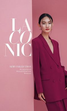 Woman in a magenta suit with a deep V-neck against a pink background