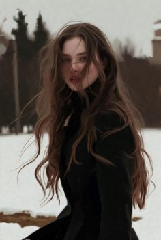Woman with long, windblown hair in a black coat outdoors in winter