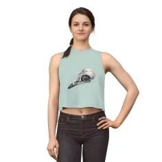 Woman in a light blue crop top with a bird skull print and dark jeans