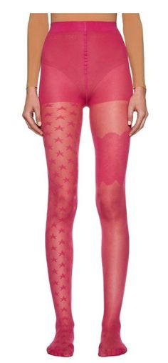 Person wearing sheer pink tights with star pattern and lace detail