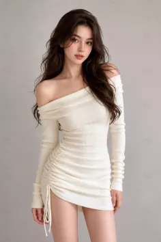 Woman in a white off-shoulder ruched dress with long dark hair