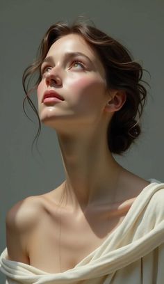 Woman with brown hair looking up, with soft lighting on her face and shoulders