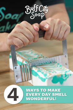 Hands cutting a block of handmade soap with a wavy cutter