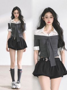 Woman with long black hair wearing an off-shoulder top and black shorts