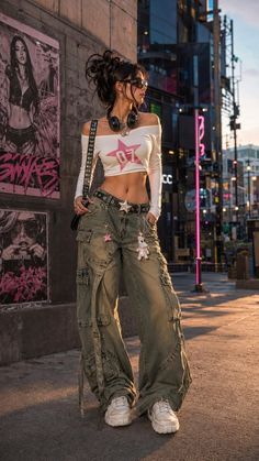 Woman in cargo pants and a crop top on a city street at golden hour