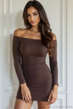 Woman in a brown off-shoulder dress posing indoors