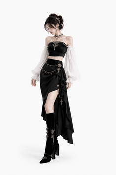 Woman in a gothic-style off-shoulder top and long skirt with high boots