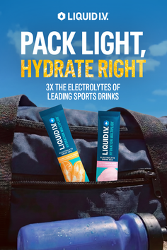 Two Liquid I.V. packets in a sports bag with a water bottle under a blue sky