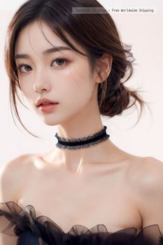 Woman with an updo wearing a black ruffled choker and dress