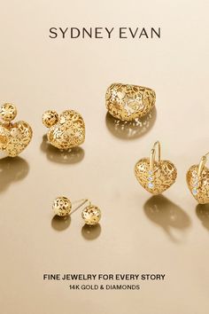 Collection of gold and diamond jewelry including earrings and a ring