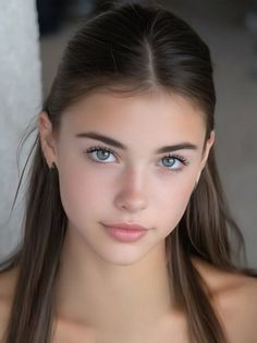 Realistic portrait of a young woman with long brown hair and blue eyes