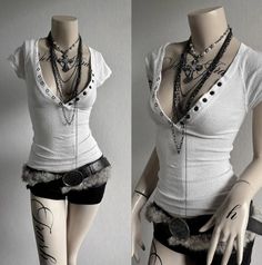 Mannequin in a white ribbed top, black shorts, and layered necklaces