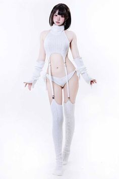 Woman in white knitwear and thigh-high socks posing on a white background