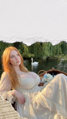Woman with long red hair in a white dress on a boat with a swan on the river