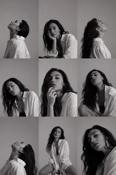 Woman with long hair in a white shirt posing in a studio