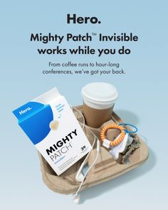 Mighty Patch product box, coffee cup, earbuds, and keys in a cardboard tray
