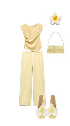 A yellow top, striped pants, handbag, and flower sandals arranged on a white background
