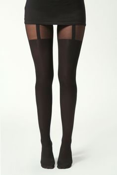 Person wearing black tights with sheer panels and a black mini skirt