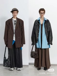 Two women in different oversized outfits and accessories standing in a studio