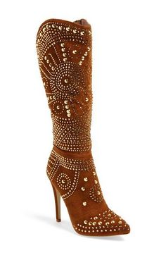 Brown knee-high boots with gold studs and high heels on a white background