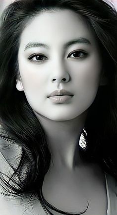 Black and white portrait of a woman with long dark hair