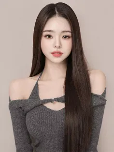 Woman with long dark hair wearing an off-shoulder top