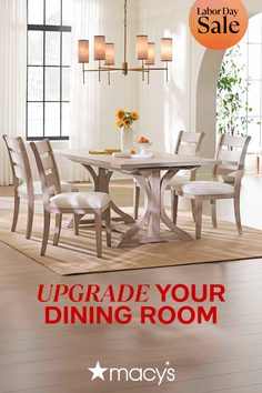 A modern dining room with a light wood table and chairs, decorated with sunflowers