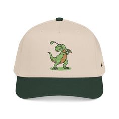 Two-tone baseball cap with an embroidered cartoon dinosaur playing golf