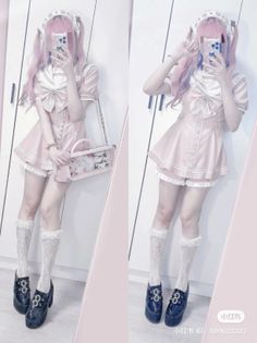 Person with pink twin tails wearing a pink sailor dress and lace socks
