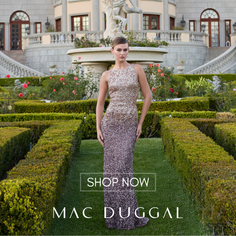 Woman in a sequin gown posing in a formal garden with a mansion in the background