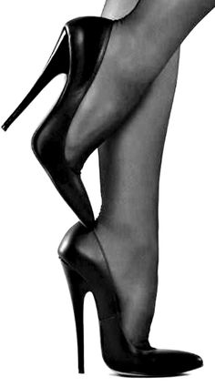 Woman's legs in stockings and high heels in a provocative pose