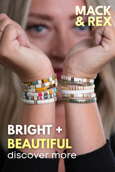 Close up of a woman's wrists adorned with colorful bracelets