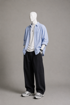 Mannequin wearing a blue shirt, white t-shirt, black pants, and sneakers