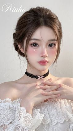 Woman with an updo and lace top, wearing a choker and sparkling makeup